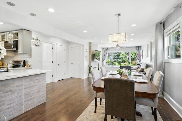 7515 W Roscoe St, Chicago, IL 60634 - dining space with healthy amount of natural light, dark wood finished floors, and recessed lighting