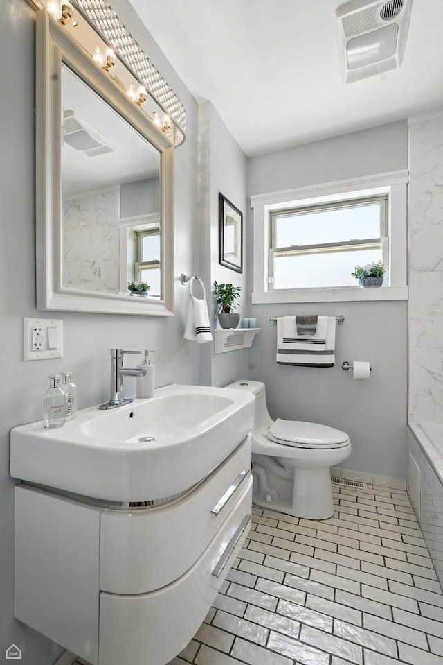 7515 W Roscoe St, Chicago, IL 60634 - bathroom with vanity, a shower, and a bathtub