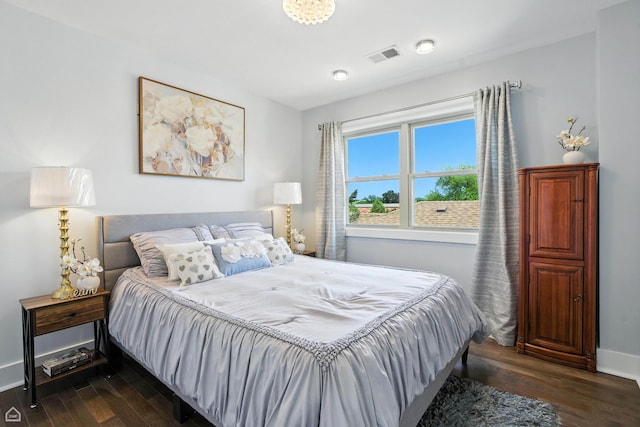 7515 W Roscoe St, Chicago, IL 60634 - bedroom featuring dark wood-style flooring
