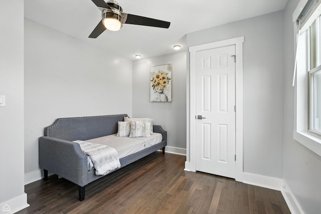 7515 W Roscoe St, Chicago, IL 60634 - living area featuring a ceiling fan and dark wood-style floors