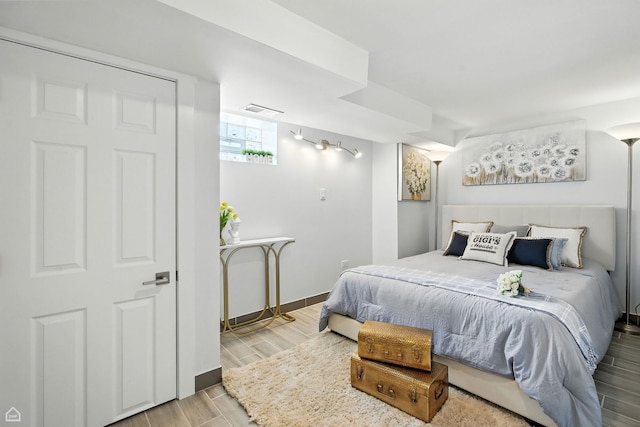 7515 W Roscoe St, Chicago, IL 60634 - bedroom with wood finished floors and baseboards