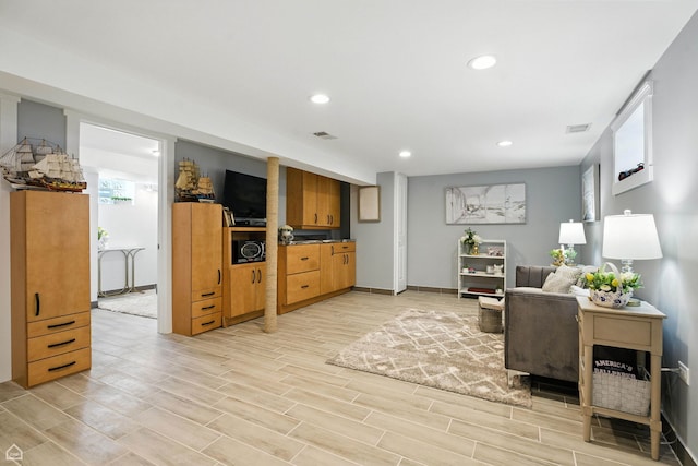 7515 W Roscoe St, Chicago, IL 60634 - living room with light wood-style floors and recessed lighting