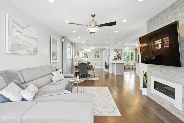 7515 W Roscoe St, Chicago, IL 60634 - living area with recessed lighting, ceiling fan, a fireplace, and wood-type flooring