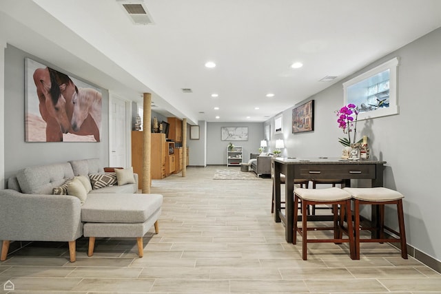 7515 W Roscoe St, Chicago, IL 60634 - living area with wood finish floors and recessed lighting