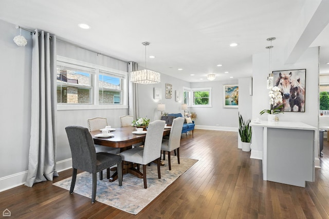 7515 W Roscoe St, Chicago, IL 60634 - dining room featuring a chandelier, dark wood-style floors, and recessed lighting