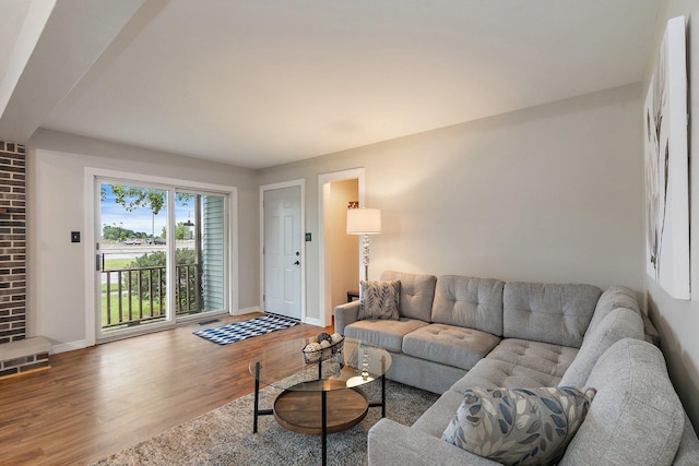 221 Barb Blvd Unit 1, Dekalb, IL 60115 - living room featuring wood finished floors and baseboards