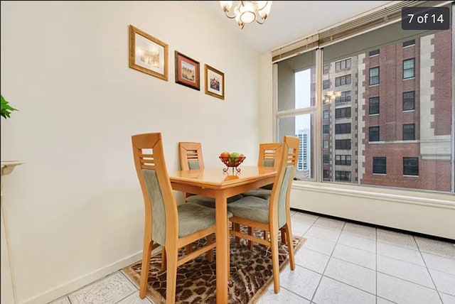 3200 N Lake Shore Dr Unit 1709, Chicago, IL 60657 - dining area with a chandelier and light tile patterned floors