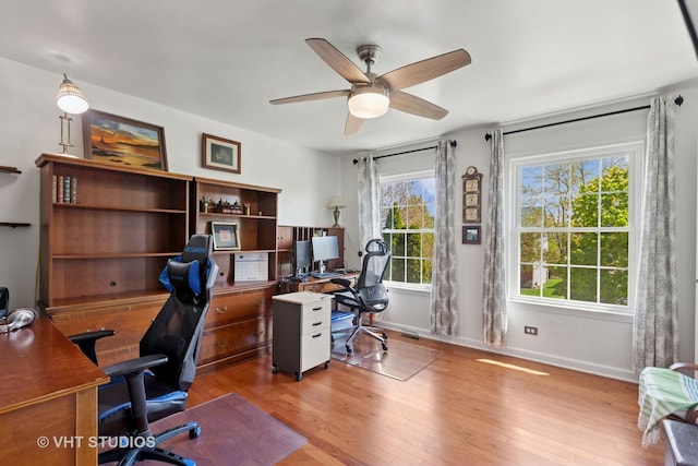 387 Essex Dr, Oswego, IL 60543 - office featuring a ceiling fan and wood finished floors