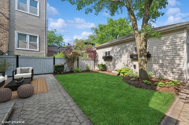 3715 N Wayne Ave, Chicago, IL 60613 - fenced backyard with a patio and an outdoor hangout area