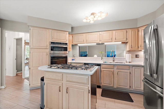10401 Lismore Ct, Orland Park, IL 60462 - kitchen featuring stainless steel appliances, light countertops, light brown cabinets, and a kitchen island