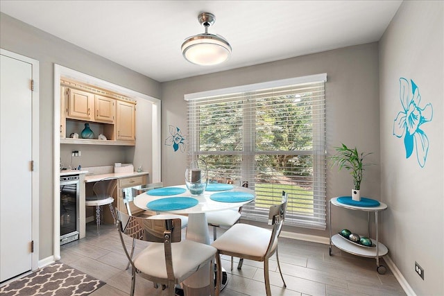 10401 Lismore Ct, Orland Park, IL 60462 - dining area with light wood-style flooring and beverage cooler