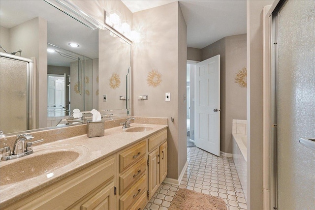 10401 Lismore Ct, Orland Park, IL 60462 - bathroom featuring double vanity, a garden tub, a stall shower, and tile patterned flooring