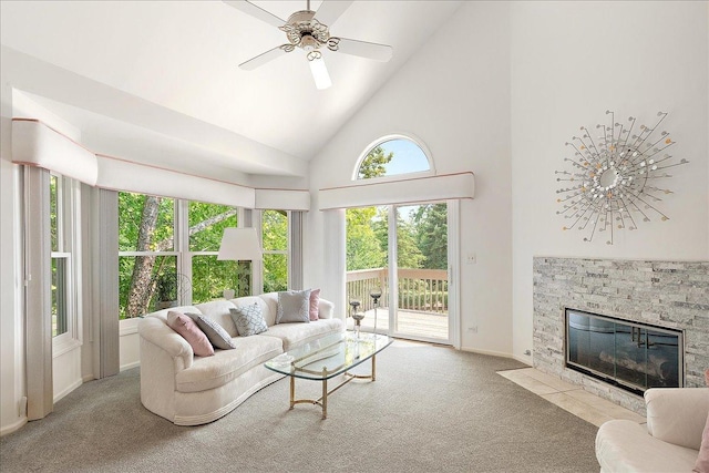10401 Lismore Ct, Orland Park, IL 60462 - carpeted living area featuring high vaulted ceiling, a fireplace, and ceiling fan