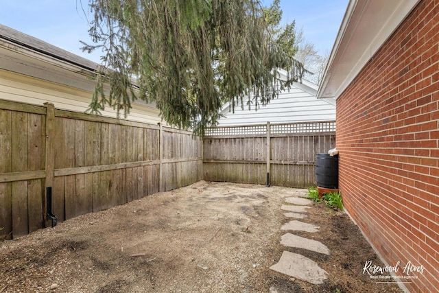 902 W Downer Pl, Aurora, IL 60506 - fenced backyard with a patio area