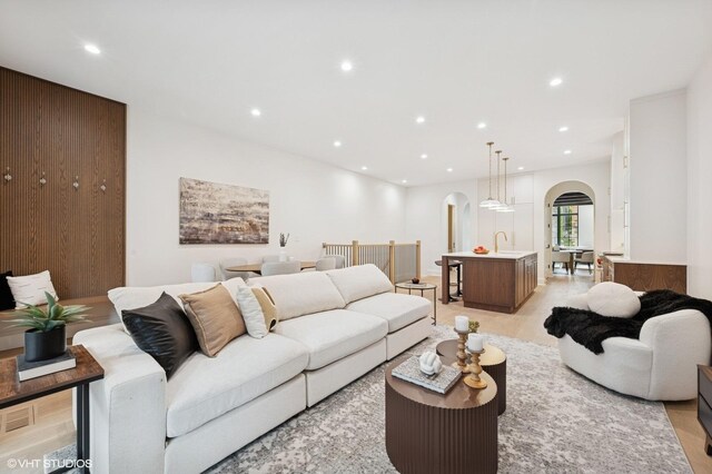 838 N Damen Ave Unit 1, Chicago, IL 60622 - living area with arched walkways and recessed lighting