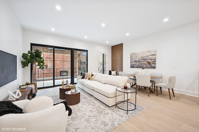 838 N Damen Ave Unit 1, Chicago, IL 60622 - living room featuring light wood-style floors and recessed lighting