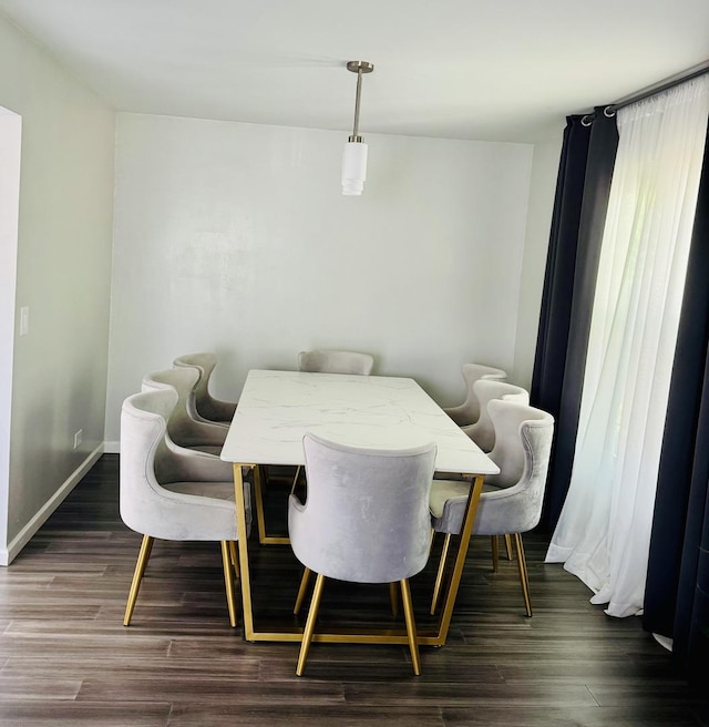 530 Cottonwood Cir, Bolingbrook, IL 60440 - dining room featuring dark wood-style flooring and baseboards