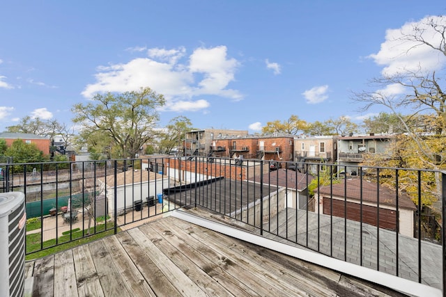 2716 W Polk St, Chicago, IL 60612 - wooden deck featuring a residential view