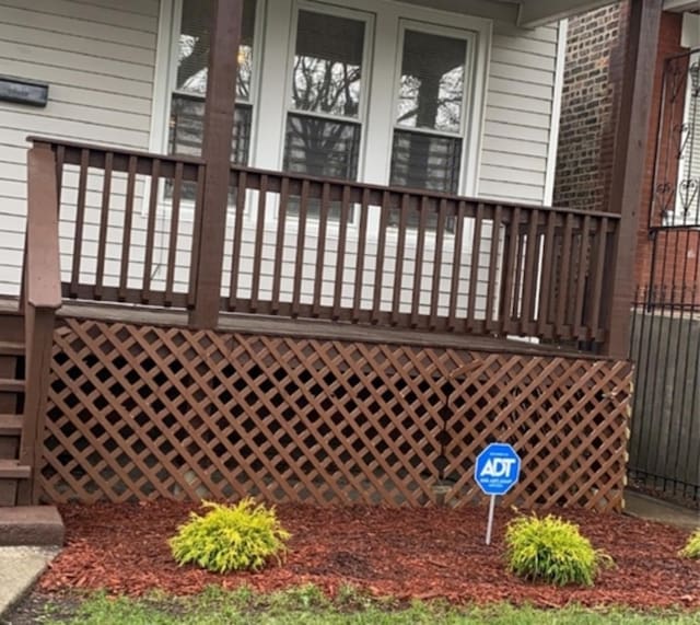 view of property exterior featuring a porch