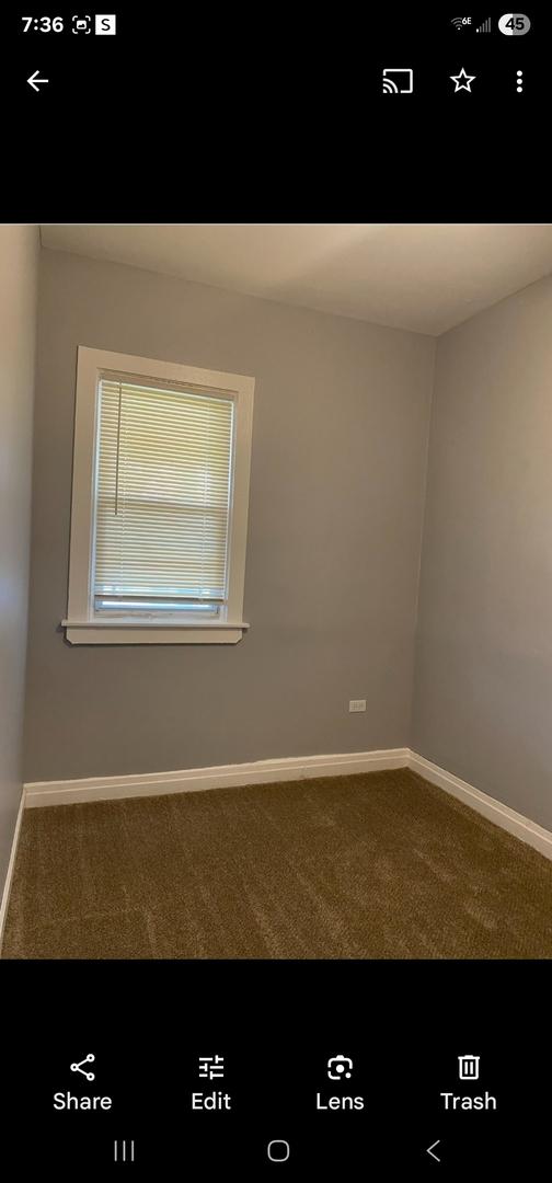 empty room featuring carpet flooring