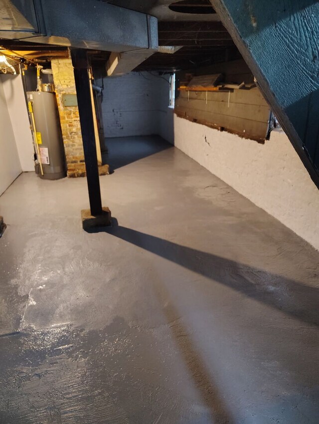 basement featuring gas water heater