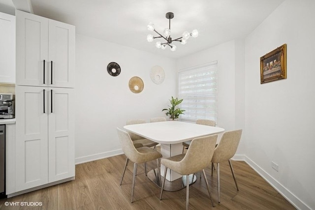 975 W Happfield Dr, Arlington Heights, IL 60004 - dining room featuring a chandelier and light wood-type flooring