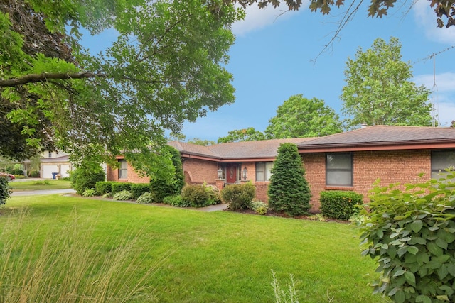 3560 Primrose Ln, Morris, IL 60450 - ranch-style house with brick siding and a front lawn