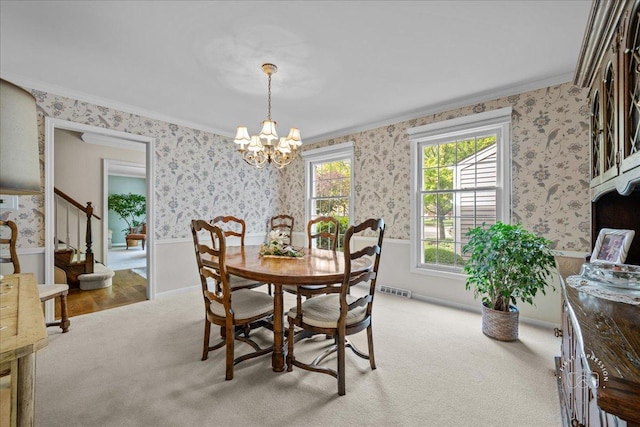 1228 N W St, Naperville, IL 60563 - dining area featuring wainscoting, a chandelier, carpet floors, wallpapered walls, and stairway