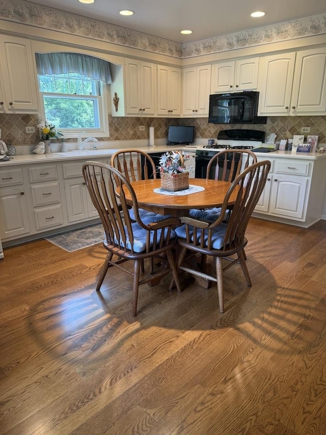 1228 N W St, Naperville, IL 60563 - dining room featuring dark wood-style flooring and recessed lighting