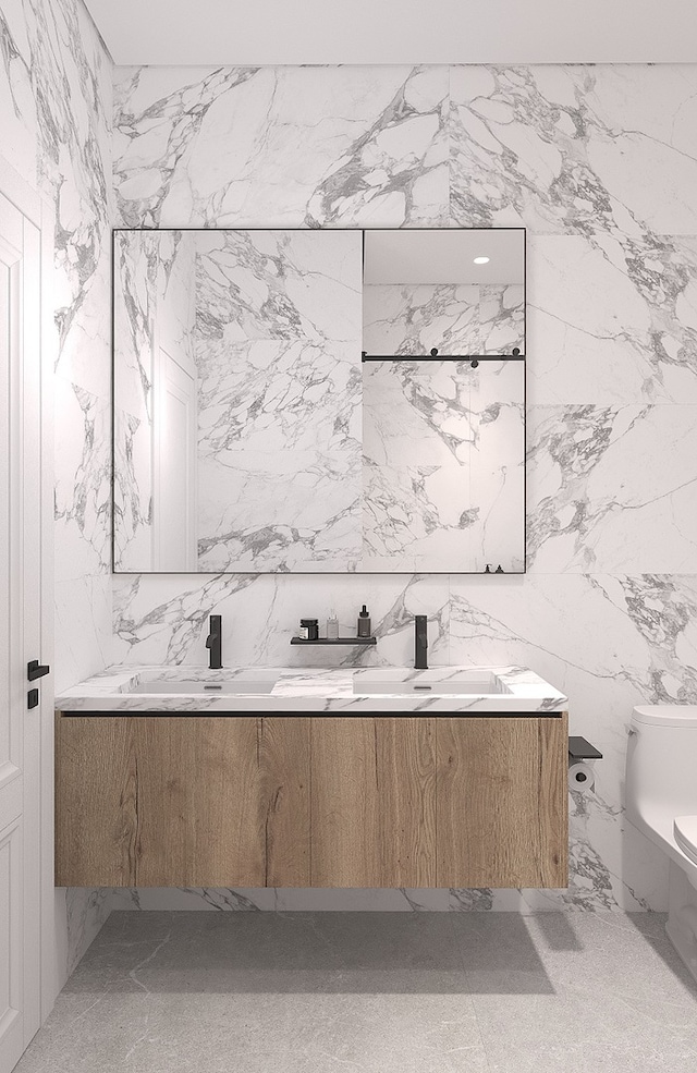2147 W Adams St Unit 3N, Chicago, IL 60612 - bathroom featuring double vanity and tile walls