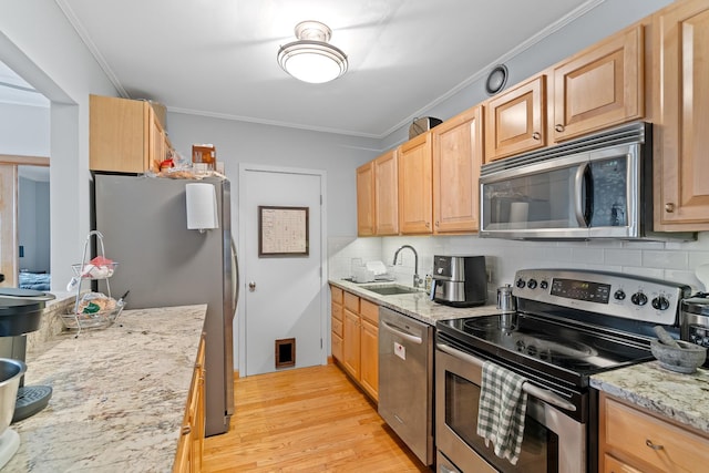 431 S Dearborn St Unit 1303, Chicago, IL 60605 - kitchen featuring stainless steel appliances, tasteful backsplash, crown molding, light wood-style floors, and light stone countertops