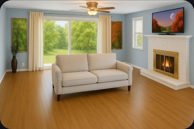 301 Cornell Ave, Calumet City, IL 60409 - living area with wood finished floors, a ceiling fan, and a fireplace