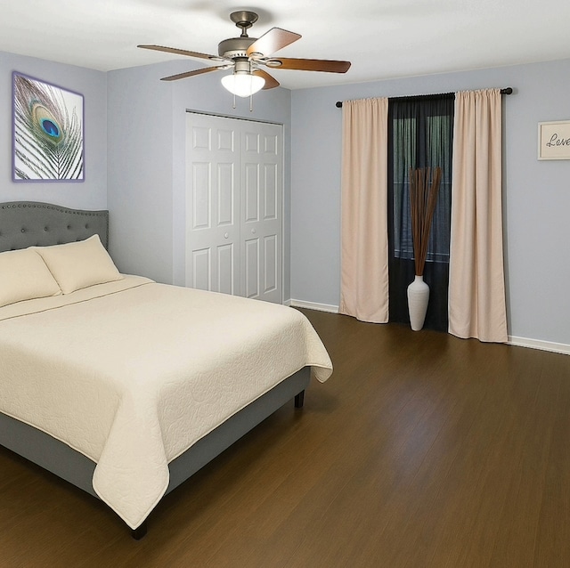 301 Cornell Ave, Calumet City, IL 60409 - bedroom with dark wood-style flooring, ceiling fan, and a closet