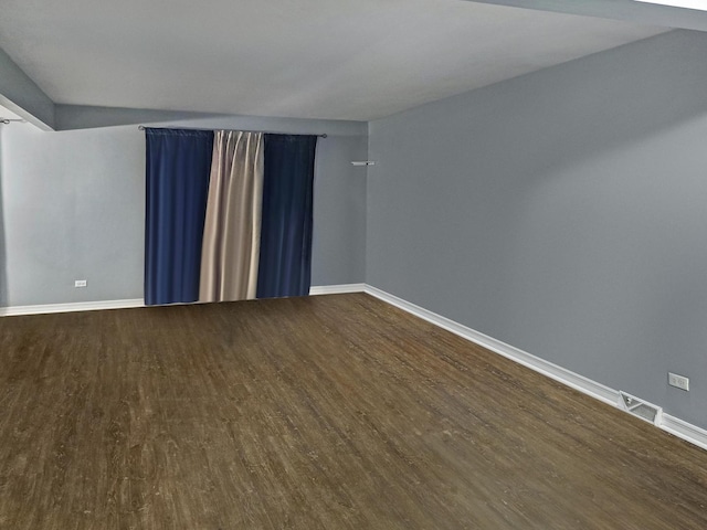 301 Cornell Ave, Calumet City, IL 60409 - empty room featuring dark wood-style flooring and baseboards