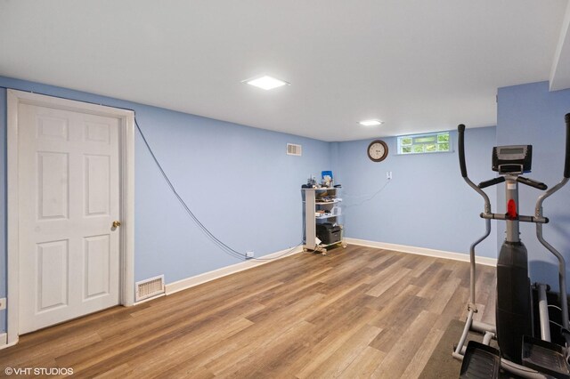 3837 Kirk St, Skokie, IL 60076 - workout area with light wood finished floors and baseboards