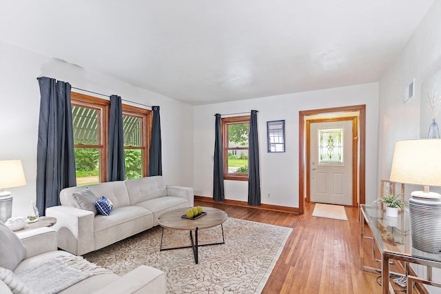 218 Mason Ct, Sycamore, IL 60178 - living room featuring light wood finished floors and baseboards