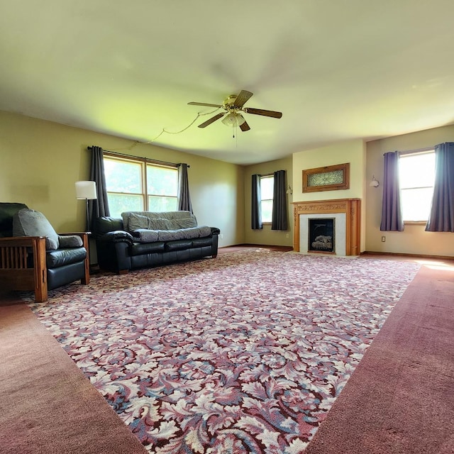 1932 N 2653rd Rd, Ottawa, IL 61350 - carpeted living room with ceiling fan and a fireplace
