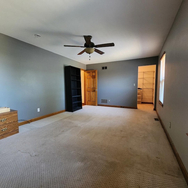 1932 N 2653rd Rd, Ottawa, IL 61350 - unfurnished bedroom featuring light colored carpet and ceiling fan