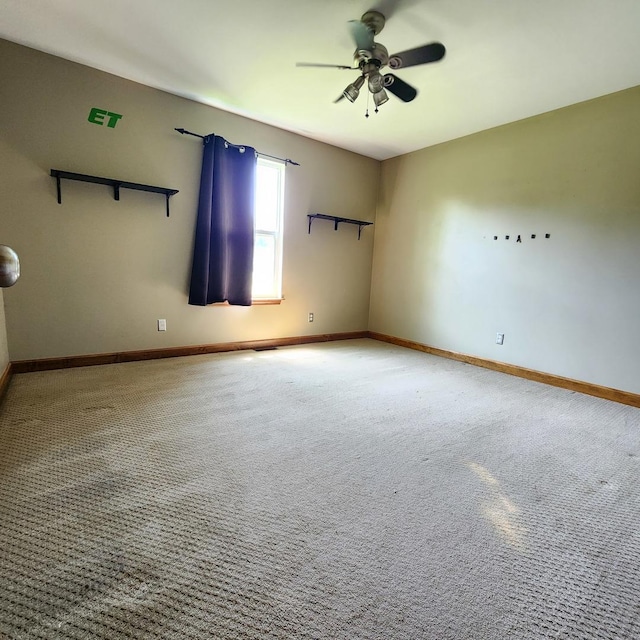 1932 N 2653rd Rd, Ottawa, IL 61350 - carpeted spare room featuring ceiling fan and baseboards