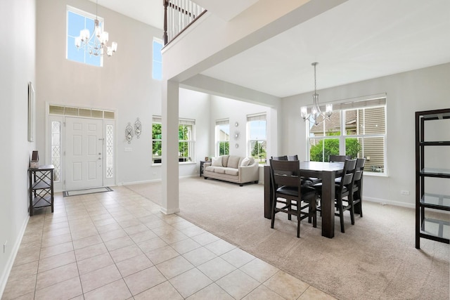 9054 Clinnin Ln, Huntley, IL 60142 - carpeted dining room with a chandelier, healthy amount of natural light, and tile patterned floors