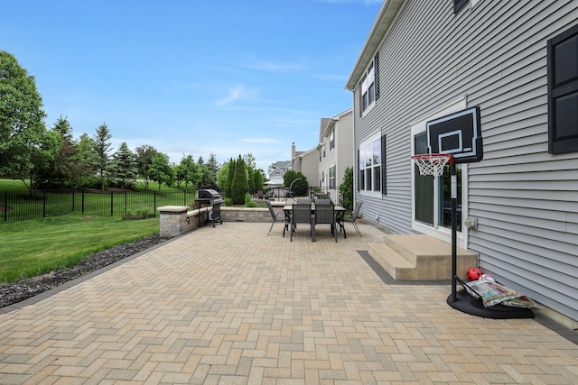 9054 Clinnin Ln, Huntley, IL 60142 - fenced backyard featuring area for grilling, a patio, and outdoor dining space