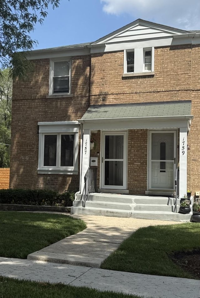 1757 Linden St, Des Plaines, IL 60018 - view of front of home featuring brick siding and a front yard