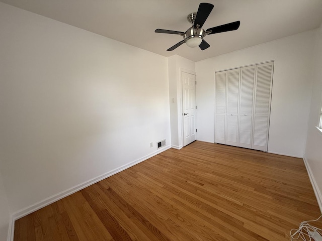 1757 Linden St, Des Plaines, IL 60018 - unfurnished bedroom featuring wood finished floors, a closet, and ceiling fan