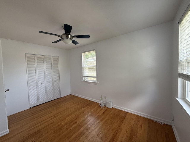 1757 Linden St, Des Plaines, IL 60018 - unfurnished bedroom featuring wood finished floors, a closet, and ceiling fan