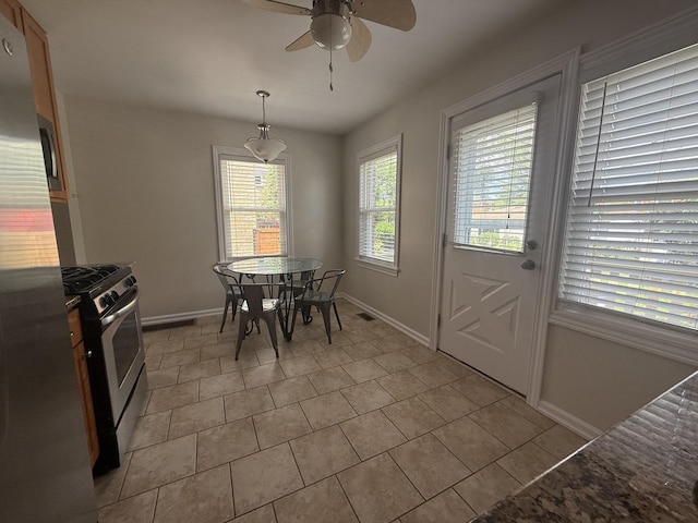 1757 Linden St, Des Plaines, IL 60018 - dining area with a ceiling fan and light tile patterned flooring