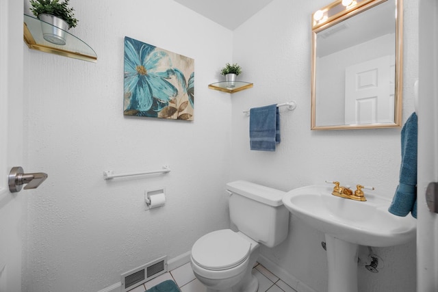 1558 Oregon Trl, Elk Grove Village, IL 60007 - half bathroom with toilet and tile patterned flooring