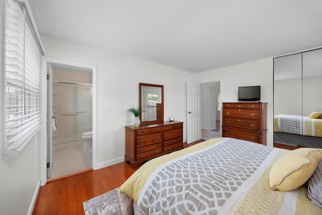 1558 Oregon Trl, Elk Grove Village, IL 60007 - bedroom with a closet, wood finished floors, and connected bathroom