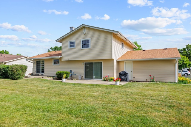 1558 Oregon Trl, Elk Grove Village, IL 60007 - rear view of property with a lawn and a patio