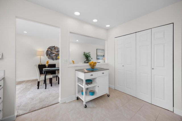 1558 Oregon Trl, Elk Grove Village, IL 60007 - interior space with light carpet, recessed lighting, a closet, and light tile patterned floors