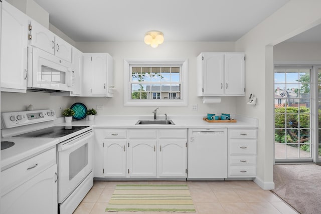 1558 Oregon Trl, Elk Grove Village, IL 60007 - kitchen with white appliances, white cabinetry, light tile patterned floors, and light countertops